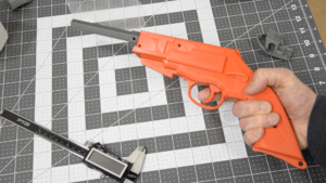 3D printed prop of Malcolm Reynolds' pistol from Firefly (Moses Brother Self-Defense Engine). Click to view full-size image.